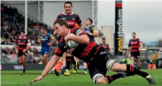  ?? PHOTO: PHOTOSPORT ?? Australian lock Dave McDuling scores his first try for Canterbury during the reigning champions 45-34 won over Otago.