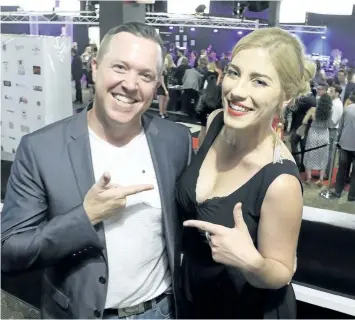 ?? JOHN LAW/POSTMEDIA NEWS ?? Country singer Brad Battle and crooner Mel Monaco share greetings at Sunday's Niagara Music Awards in Niagara Falls, where both had five nomination­s. Battle won two awards for country artist and songwriter of the year.