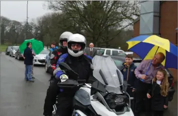  ??  ?? New Coollattin golf club captains Hugh Kane and Mary Kavanagh arrive in style.