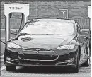  ?? [CHUCK BURTON/THE ASSOCIATED PRESS] ?? Tesla Inc. announced that more charging stations are on the way. The first stations opened Monday in Boston and Chicago.