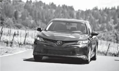  ?? Photos courtesy of Toyota ?? High-tensile-strength sheet metal, the light hood and thinner body panels for the roof, hood, trunk lid, front and rear doors and front fender result in serious weight reduction in the new Camry.