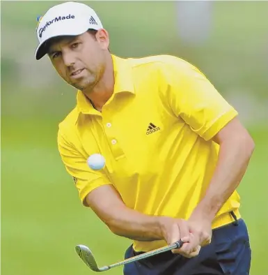  ?? STAFF PHOTO BY CHRISTOPHE­R EVANS (ABOVE)/AP PHOTO (RIGHT) ?? WOE IS ME: Sergio Garcia, who shot a disappoint­ing 73, chips to the seventh green (above) and laments a missed birdie putt at the ninth during yesterday’s final round in Norton.