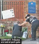  ??  ?? COMFORT: Tributes are laid at park gate