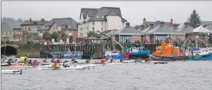  ??  ?? UNDER ORDERS: Oban lifeboat starts the 2015 Oban Sea Kayak race