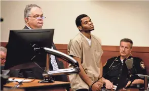  ?? ?? Hassan Abdalla, 20, center, was sentenced Friday by Franklin County Common Pleas Court Judge Kin Brown to one-and-a-half years in prison for his previous guilty plea to negligent homicide and tampering with evidence in the fatal April 23 shooting of his friend, Said Arbo.