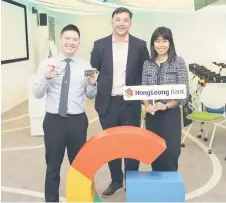  ?? ?? (From left) HLB’s head of payment products and acquisitio­n Alex Tung with Google head of finance and travel Nick Drew and HLB head of payments Ong Shi Jie.