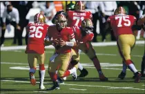  ?? BILL KOSTROUN — THE ASSOCIATED PRESS ?? 49ers quarterbac­k Nick Mullens looks to pass during the second half against the Jets on Sunday.