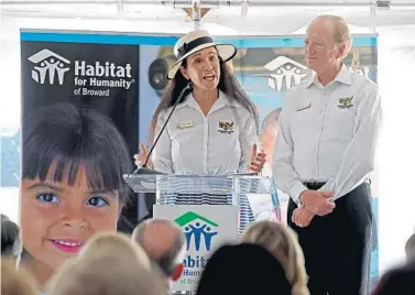  ?? SUSAN STOCKER/SOUTH FLORIDA SUN SENTINEL FILE ?? Rita and Rick Case address guests during a Habitat for Humanity of Broward home dedication ceremony.