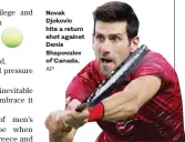  ?? AP ?? Novak Djokovic hits a return shot against Denis Shapovalov of Canada.