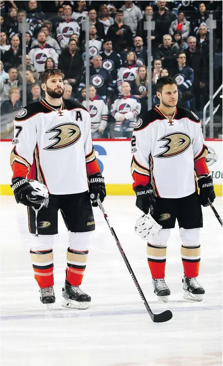  ?? — GETTY IMAGES FILES ?? Former Canucks Ryan Kesler and Kevin Bieksa are hoping for better days ahead with the Anaheim Ducks with Kesler ailing due to a hip injury and Bieksa struggling to find his form on the ice.