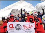  ??  ?? CARING: The members of the team representi­ng the Avela Foundation are back in South Africa after a challengin­g, yet rewarding trek to Mount Everest Base Camp.