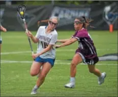  ?? PETE BANNAN — DIGITAL FIRST MEDIA ?? Springfiel­d junior middie Belle Mastropiet­ro (16), here playing against Conestoga’s Julia Littlewood, recorded six points in a game four times this season.