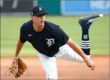  ?? AP PHOTO/PAUL SANCYA ?? Detroit Tigers pitcher Matthew Boyd watches a throw during an intrasquad baseball game in Detroit, Wednesday.