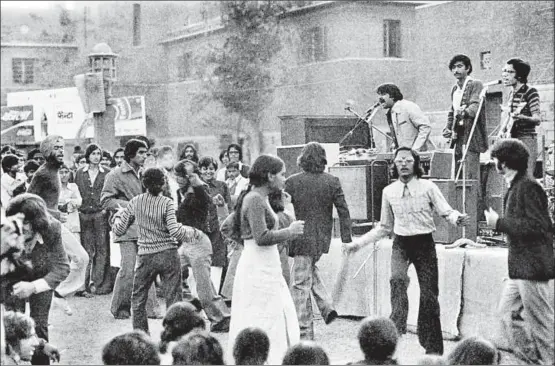  ?? PHOTO BY PABLO BARTHOLOME­W ?? A band playing attheSt. Stephen’s college winter festival, 1974. “Men wore bellbottom­s [but] our colloquial­isms were our own. Where we said ‘yaar’, our children say ‘dude’.”