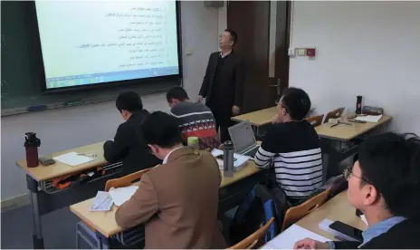  ?? Lu-Hai Liang for The National ?? Lin Feng Min is director of the Arabic department at Peking University