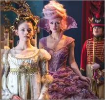  ?? Associated Press photo ?? This image released by Disney shows Mackenzie Foy, left, and Keira Knightley in a scene from “The Nutcracker and the Four Realms.”