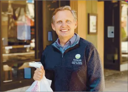  ?? COURTESY OF LARRY KLEIN ?? Sunnyvale Mayor Larry Klein stands outside the Oxford Gastropub on Murphy Street, the 43rd stop on his Sunnyvale Restaurant Project.