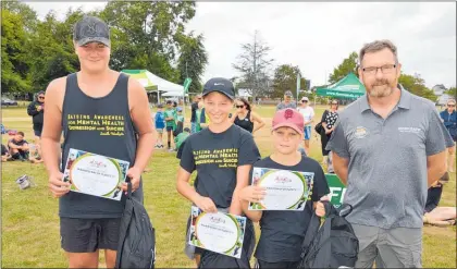  ?? Photos / Supplied ?? AgriKids winners from St Mary’s Catholic School, Putaruru (from left) Liam, Genevieve and Isaac with WorkSafe’s Al McCone.