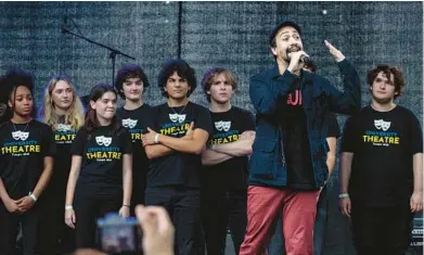  ?? WILLIE J. ALLEN JR./ORLANDO SENTINEL ?? Actor, playwright, filmmaker and singer Lin-Manuel Miranda speaks to the crowd and announces the University Theatre Troupe during the MadSoul Music & Arts Festival at Loch Haven Park in Orlando on Saturday. The MadSoul festival and fundraiser was created by U.S. Rep. Maxwell Frost. D-Orlando.