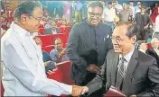  ?? PTI PHOTO ?? ■ Supreme Court judge Justice Ranjan Gogoi (right) with senior Congress leader P Chidambara­m in New Delhi on Thursday.