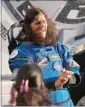 ?? JOHN RAOUX / AP ?? NASA astronaut Suni Williams laughs with relatives on May 6 at the Cape Canaveral Space Force Station in Cape Canaveral, Fla.