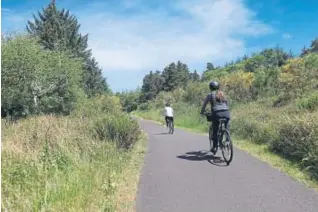  ??  ?? Nine miles of paved cycling trails wind through the 4,300-acre Fort Stevens State Park.