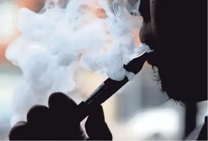  ??  ?? The FDA released new guidelines last month regulating the sale of flavored e-cigarettes.