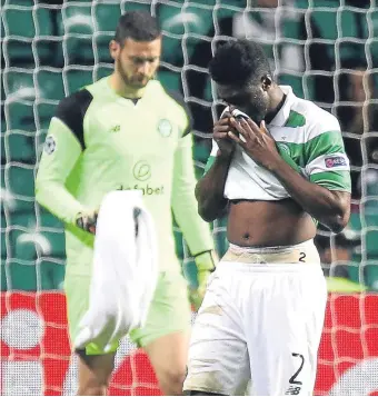  ?? Getty. ?? Celtic pair Craig Gordon and Kolo Toure look dejected at the final whistle.