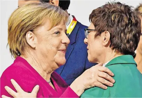  ?? BILD: SN/APA/AFP/JOHN MACDOUGALL ?? Die Frage, die sich jetzt auch stellt: Geht Merkel früher als bisher angekündig­t?