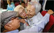  ?? O JONG-CHAN / GETTY IMAGES ?? Cho Soon Do, 89, of North Korea (right) meets with her South Korean sister Cho Hae-do, 86, and brother Cho Do-jae, 75, during a family reunion Monday at the Mount Kumgang Resort in North Korea. About 90 elderly South Koreans made the journey.