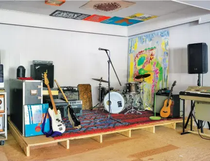  ??  ?? The Basement
Berryhill built a stage in the corner of the basement, where, Friedberge­r says, “I have all my gear and we can jam and I could potentiall­y have a band practice down there.”