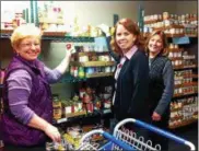  ?? SUBMITTED PHOTO ?? Last year’s efforts filled the cupboard for the spring. The MLK CommUNITY of Greater Kennett Square asking the community to rally to help Kennett Food Cupboard and West Grove Bridge Food Cupboard.