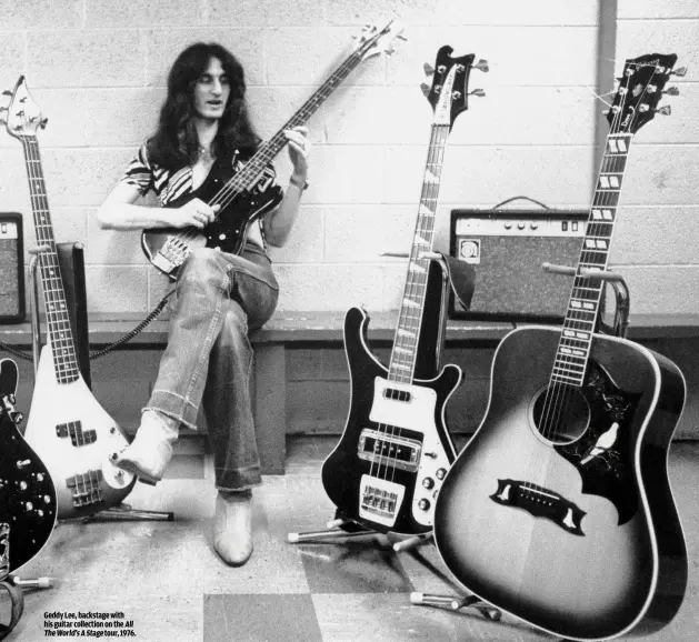  ??  ?? GEDDY LEE, BACKSTAGE WITHHIS GUITAR COLLECTION ON THE ALL THE WORLD’S A STAGE TOUR, 1976.