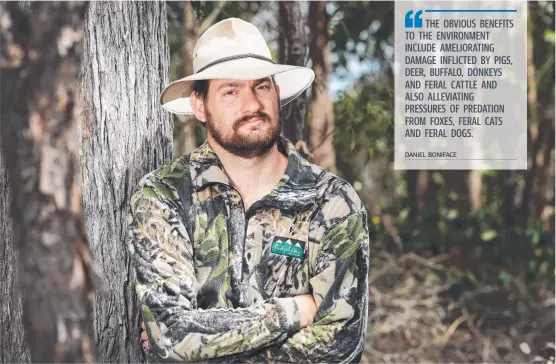  ?? Picture: NIGEL HALLETT ?? PETITION: Daniel Boniface is campaignin­g for Queensland Parliament to allow the hunting of feral game in state forests.