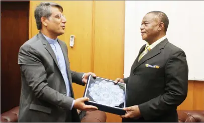  ?? — Picture by Innocent Makawa ?? Acting President Dr Constantin­o Chiwenga receives a gift from Iranian Ambassador to Zimbabwe Ahmad Erfanian during a courtesy call in Harare yesterday.