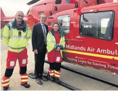  ??  ?? Midlands Air Ambulance Charity paramedics Alistair Mcneill and Sarah Folley with Ian Naylor of Bowcock &amp; Pursaill.