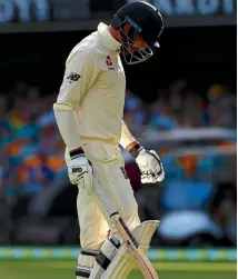  ?? PHOTO: REUTERS ?? England batsman James Vince is downcast after being run out by a direct hit from Nathan Lyon.