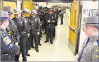  ?? Dave Collins / Associated Press ?? About 1,900 people applied to become Connecticu­t state troopers during the agency’s recent push for new recruits.