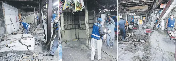  ?? FOTOS: ALEJANDRO AMADOR ?? Con almádanas son destruidas las paredes antiguas del mercado, que han dividido los puestos. Expertos en electricid­ad trabajan en el retiro y reubi- El área donde trabajan en la actualidad servirá como cación del sistema eléctrico de los cubículos....