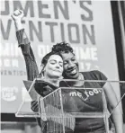  ??  ?? McGowan joins Tarana Burke, founder of Me Too, at the Women’s Convention in Detroit. JUNFU HAN/DETROIT FREE PRESS