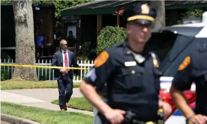  ?? Photograph: Jeenah Moom/AP ?? Police search the home of Rex Heuermann, in Massapequa Park, New York, on Saturday.