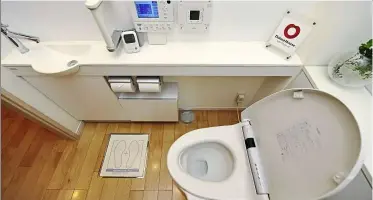  ??  ?? High- tech: the ‘ Intelligen­t toilet’, manufactur­ed by toto for daiwa House at a show room in tokyo.