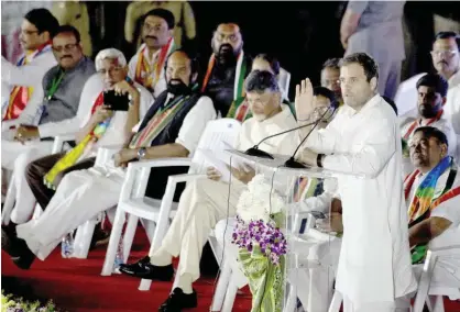  ?? Associated Press ?? Rahul Gandhi speaks during an election campaign rally in Hyderabad on Wednesday. NIZAMABAD: