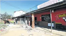  ??  ?? RANSACKED: This Zimbabwean-run shop in KwaMashu was looted and damaged on Monday night. The property is owned by a South African