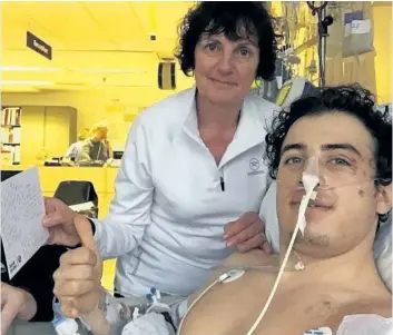  ?? HANDOUT ?? Mark McMorris recovers in a Vancouver hospital as his mother Cindy looks on in a photo from his brother Craig’s Instagram feed. It’s been three days since the Olympic bronze medallist was seriously injured in a crash while backcountr­y snowboardi­ng near...