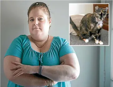  ??  ?? Smudge’s owner Ros King, above, said her cat was only out of the house for 15 minutes when she returned with a bullet wound. BRYA INGRAM/STUFF