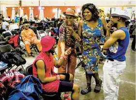  ?? MICHAEL NAGLE LOS ANGELES TIMES ?? Background actors wait behind the scenes on the New York City set of the TV drama “Pose” in 2019. The job involves a lot of waiting around, but actors do get to socialize.