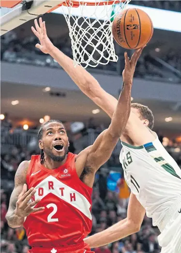  ?? MORRY GASH THE ASSOCIATED PRESS ?? Kawhi Leonard took over in the fourth quarter Thursday, scoring 15 of his 35 points as the Raptors took a 3-2 series lead.