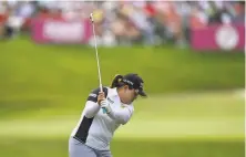  ?? Stuart Franklin / Getty Images ?? Seventime major winner Inbee Park leads a loaded South Korea squad at Kasumigase­ki Country Club near Saitama.