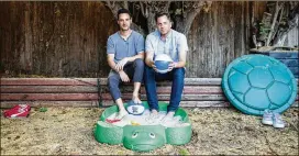  ?? PHOTOS BY ANDREW CULLEN / NEW YORK TIMES ?? Barry McLaughlin (left) and Jason Lautenschl­eger, seen recently in the backyard of Lautenschl­eger’s Los Angeles home, co-founded Barry & Jason Games and Entertainm­ent, which they started with help from crowdfundi­ng.